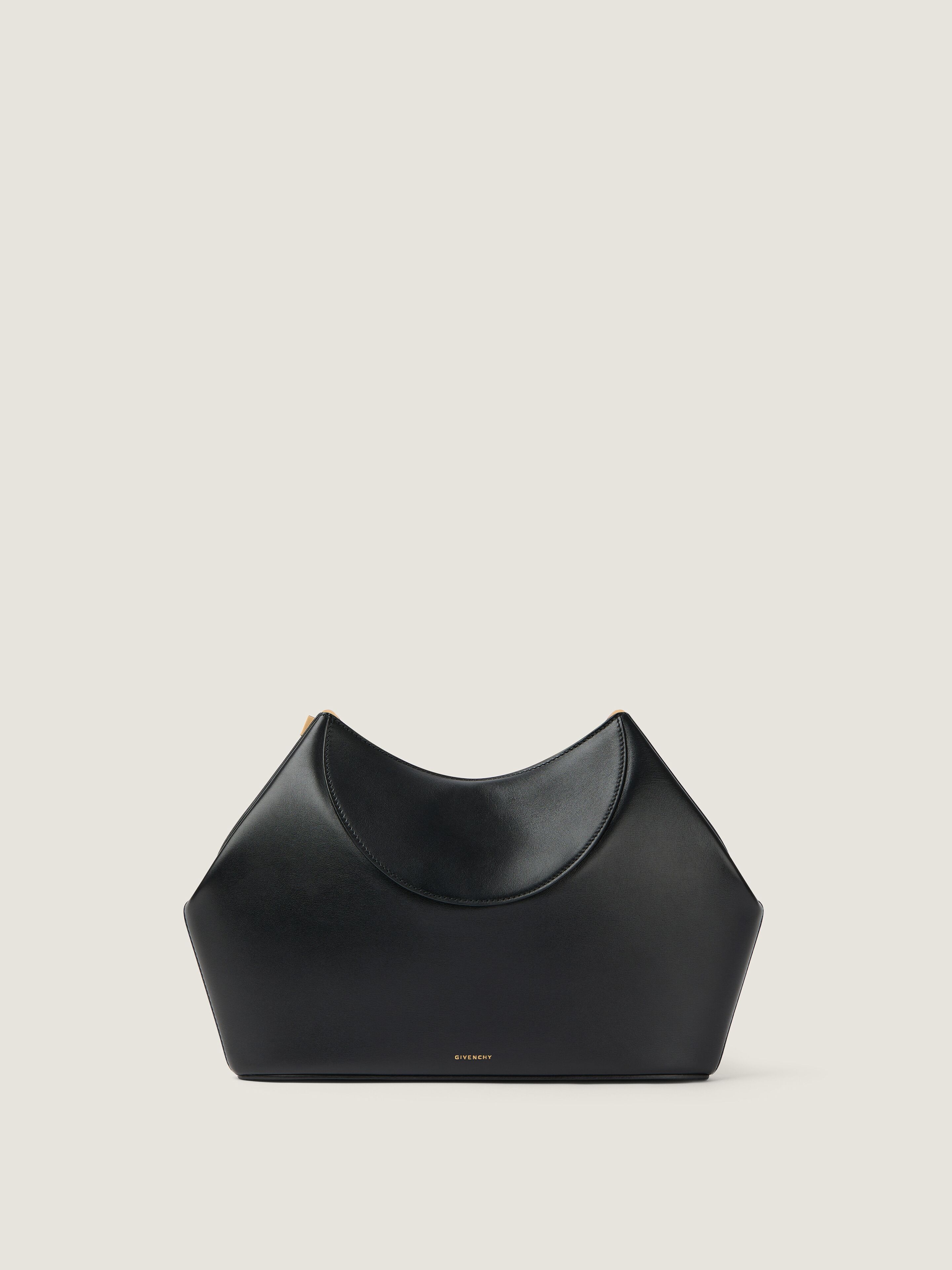 Facet clutch in leather